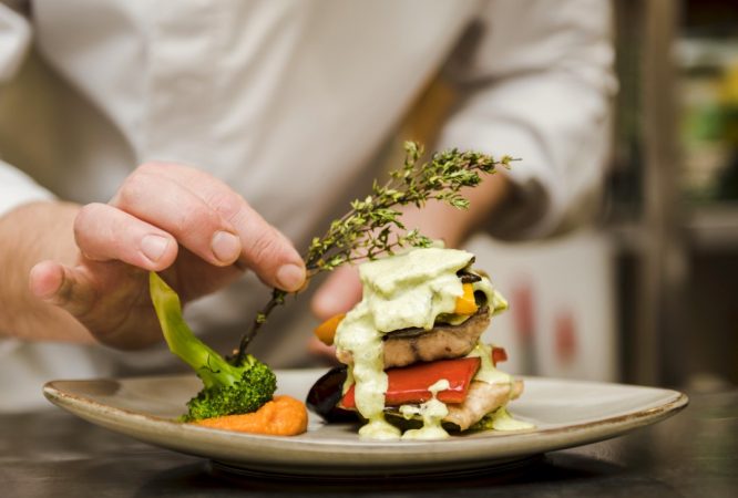 chef-placing-herb-gourmet-meal (Medium)